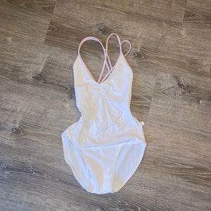 Class in white and pink leo